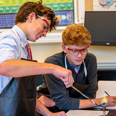 Two students experimenting. Links to Gifts from Retirement Plans