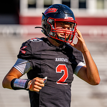 A student football player. Links to Gifts That Protect Your Assets